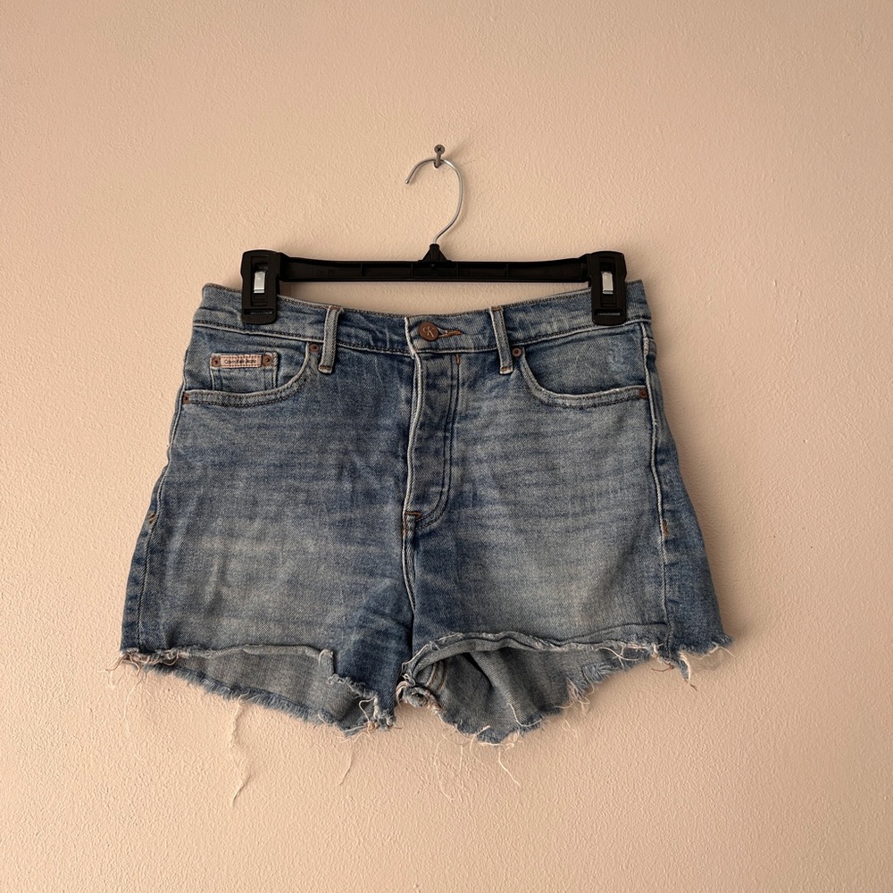 Calvin Klein distressed mid wash denim shorts